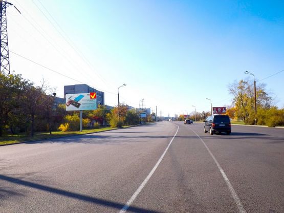 Фото рекламной плоскости по адресу вул. Наб. Заводська, за залізничним мостом, з центру /ул. Наб. Заводская, за ж/д мостом, из центра, поток движения от Амурского к Кайдакскому мосту