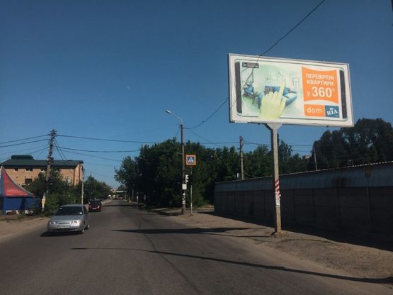 Фото рекламної площини за адресою вул.Любарського, з центру (буд.№10)/ул.Белостоцкого, из центра (дом №10)