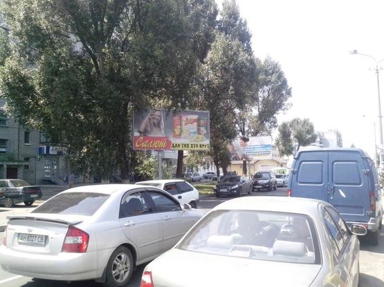 Фото рекламной плоскости по адресу вул.Калинова, 1/ул.Калиновая, 1, торговый центр, магазины, поток от ул.Коссиора к пр.Слобожанскому