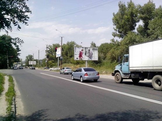Фото рекламной плоскости по адресу вул.Наб.Перемоги, 134/ул.Наб.Победы, 134 перекресток с пер.Добровольцев