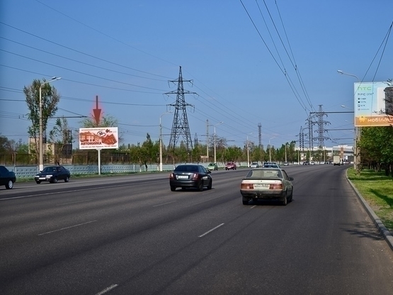 Фото рекламної площини за адресою вул. Набережна Заводська, електроопора 243-245, перед заводом Євраз, на стороні заводу/ул. Набережная Заводская, электроопора 243-245, перед заводом ЕВРАЗ, на стороне завода