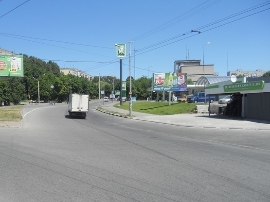 Фото рекламної площини за адресою вул. Панікахи (заправка ОККО, вулканізація), до ТРЦ Терра/ул. Паникахи (заправка "ОККО", вулканизация), к ТРЦ "Терра"