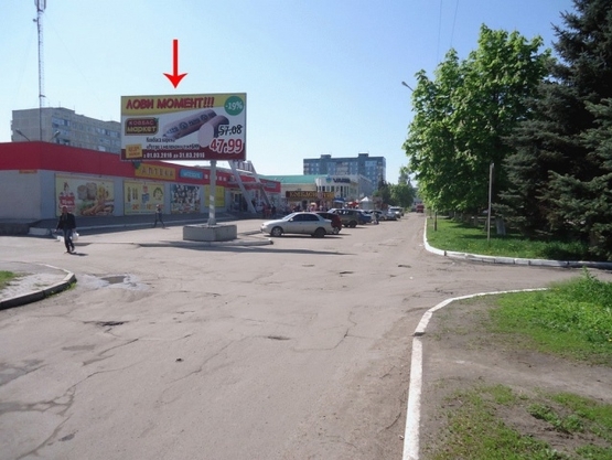 Фото рекламної площини за адресою пр-т Шахтобудівників, 13, біля супермаркету "КАПІ" з центру/Шахтостроителей пр-т 13, возле супермаркета КАПИ, из центра