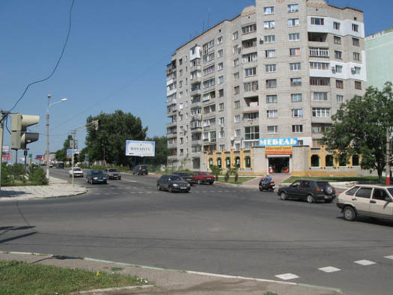 Фото рекламной плоскости по адресу перекрёсток ул.В.Шума и ул.1Мая, №16-А