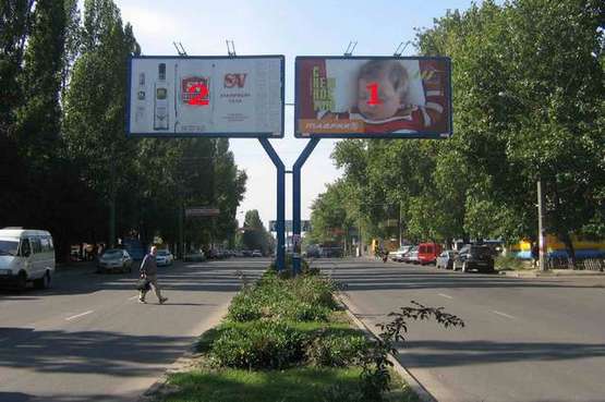 Фото рекламной плоскости по адресу пр-т Ак.Глушко -МакДональдс Чебурашка (на пл. Деревянко)