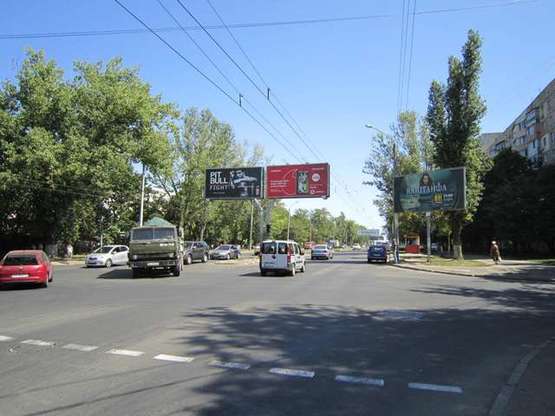 Фото рекламной плоскости по адресу пр-т Ак.Глушко, 25 - ул. Ильфа и Петрова Чебурашка (на МакДональдс)