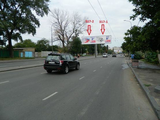 Фото рекламной плоскости по адресу ул. Щорса, 109 (на разделителе к ТЦ Аэропортовский) (левая)