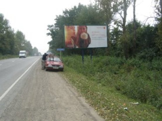 Фото рекламной плоскости по адресу Калуське шосе (знак Угринів)