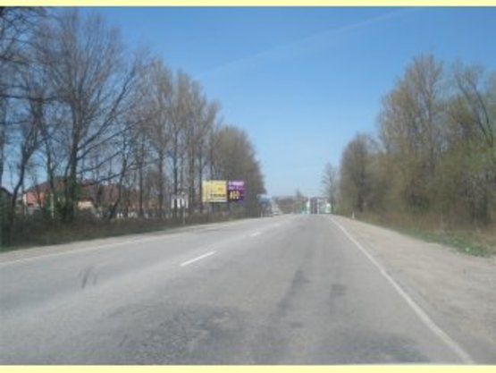 Фото рекламної площини за адресою Калуське шосе (знак Угринів)             перед WOG      виїзд