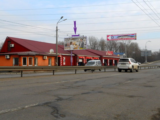 Фото рекламной плоскости по адресу ул.Луговая напротив „Каравана” направление Оболони Фото рекламной плоскости по адресу ул.Луговая напротив „Каравана” направление Оболони