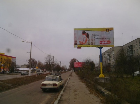 Фото рекламной плоскости по адресу Коростишів в. Більшовицька 103(ГУСЬ), центральна вулиця, напрямок з Житомира на Київ, напроти с/м "ФУРШЕТ",ст.А Фото рекламной плоскости по адресу Коростишів в. Більшовицька 103(ГУСЬ), центральна вулиця, напрямок з Житомира на Київ, напроти с/м "ФУРШЕТ",ст.А