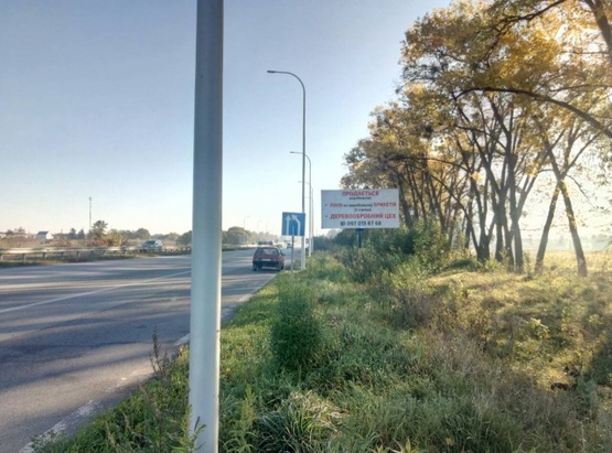 Фото рекламної площини за адресою Траса Житомир-Київ. За заправкою "Сокар", напрямок з Житомира на Київ ст.А