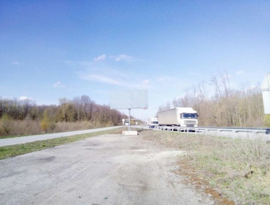 Фото рекламной плоскости по адресу Траса Житомир-Рівне,біля Новограду, напрямок з Рівного на Житомира, ст.Б