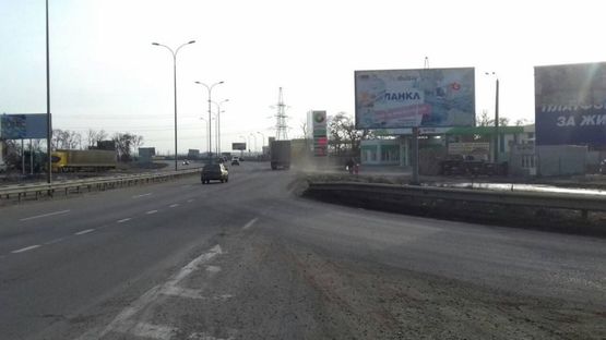 Фото рекламной плоскости по адресу Объезд г.Одесса 20+300 А Фото рекламной плоскости по адресу Объезд г.Одесса 20+300 А