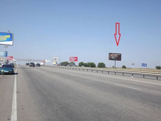 Фото рекламної площини за адресою Овидиопольская дорога (промрынок) - напротив Эпицентра