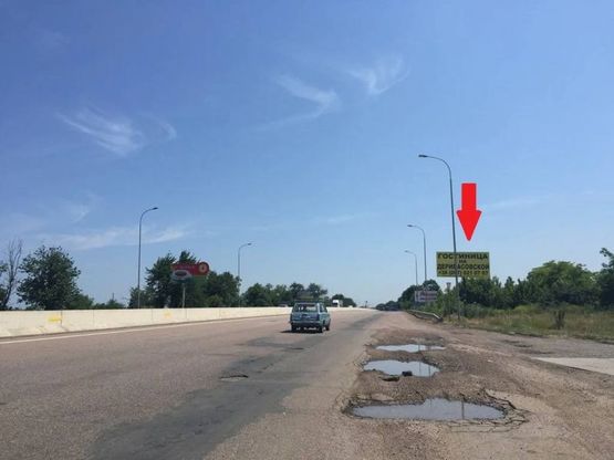 Фото рекламної площини за адресою Киевское шоссе - пос. Нерубайское  - выезд с АЗС WOG