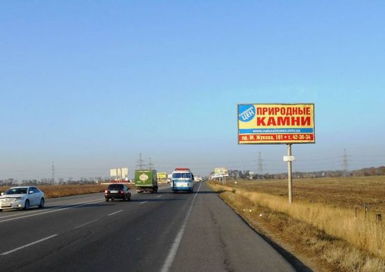 Фото рекламної площини за адресою Объездная дорога - Анжелика (21+230) (А), от двух столбов к мосту Фото рекламної площини за адресою Объездная дорога - Анжелика (21+230) (А), от двух столбов к мосту