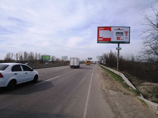 Фото рекламной плоскости по адресу Киевская трасса_ 1 (А)-мост, из города Фото рекламной плоскости по адресу Киевская трасса_ 1 (А)-мост, из города