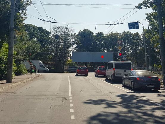 Фото рекламной плоскости по адресу Т-подібне перехрестя вул.Кам'янецька - Інститутська. неподалік: студмістечко, супермаркети, банки, піцерії, кафе, ресторани (в центр) [праве вухо]