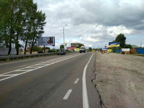 Фото рекламной плоскости по адресу Траса "Київ-Іванків-Овруч", Р-02 км 20+920 ліво, с. Нові Петрівці Фото рекламной плоскости по адресу Траса "Київ-Іванків-Овруч", Р-02 км 20+920 ліво, с. Нові Петрівці