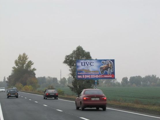 Фото рекламной плоскости по адресу А/д Киев-Черкассы 08, км 21+050 м, слева / в Киев; АФ "Наша Ряба"; за выездом из с.Мирное / а-д Н-08 Киев-Днепропетровск-Запорожье