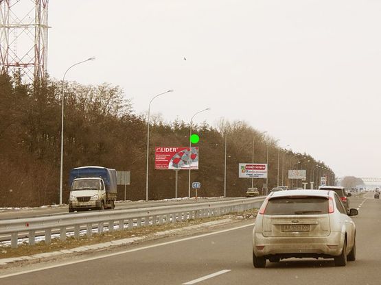 Фото рекламной плоскости по адресу А/д Киев-Полтава-Харьков 08; км 48+100 м, слева / из Киева; за АЗС, выезд из с. Иванков (стихийный рынок)