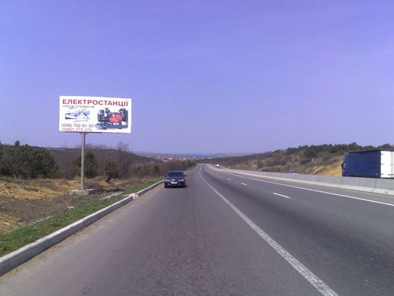 Фото рекламной плоскости по адресу Трасса « Киев-Одесса», 449+200 Б (справа)