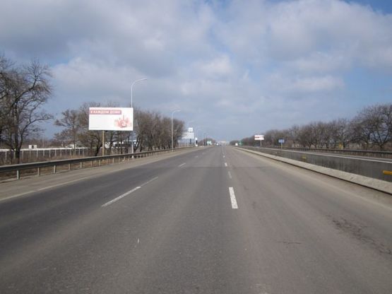 Фото рекламної площини за адресою Трасса « Киев-Одесса», 453+00  Б (справа)