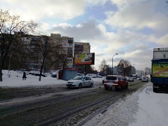 Фото рекламної площини за адресою ул.Декабристов 7, в стороону ст.м. Харьковская (ЕкоМаркет) (сторона Б)