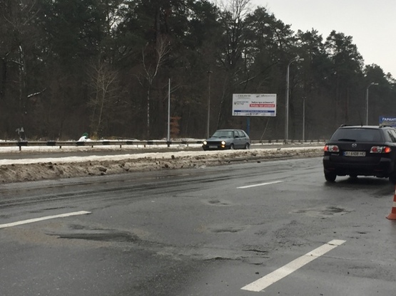 Фото рекламної площини за адресою ул. Городская  (В) направление к  АШАНУ и Эпицентру