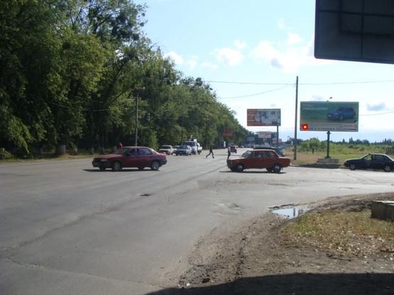 Фото рекламної площини за адресою ул. К.Шоссе – ул. Серёгина (на Харьков) Фото рекламної площини за адресою ул. К.Шоссе – ул. Серёгина (на Харьков)