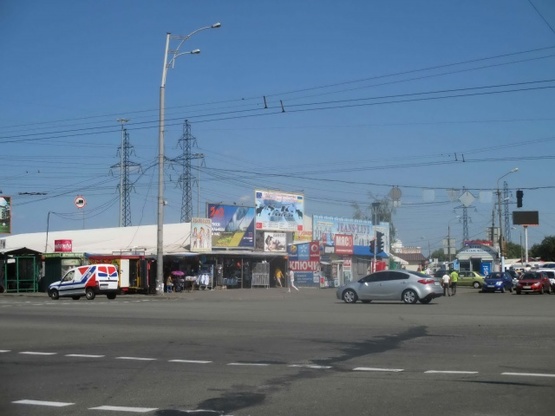Фото рекламной плоскости по адресу Ул.Электротехническая/Драйзера (Троещинский р-к) А