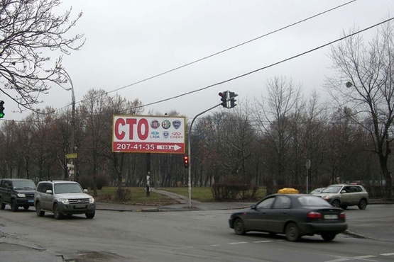 Фото рекламної площини за адресою ул.Туполева/ул.Салютная - поворот к Экспоплаза