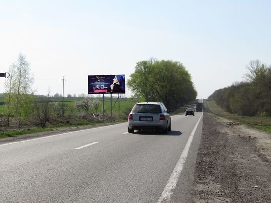 Фото рекламной плоскости по адресу Сумы-Харьков трасса, въезд в Богодухов, перед знаком, из Харькова Фото рекламной плоскости по адресу Сумы-Харьков трасса, въезд в Богодухов, перед знаком, из Харькова