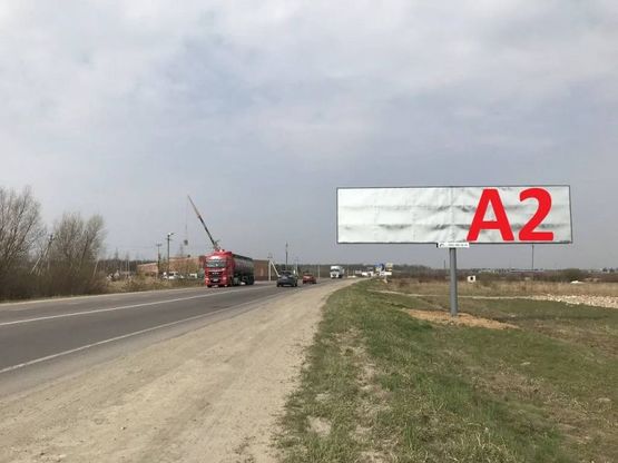 Фото рекламной плоскости по адресу Обїздна М-10, Західний обхід м. Львів, с.Скнилів в сторону МETRO (лівий) Фото рекламной плоскости по адресу Обїздна М-10, Західний обхід м. Львів, с.Скнилів в сторону МETRO (лівий)