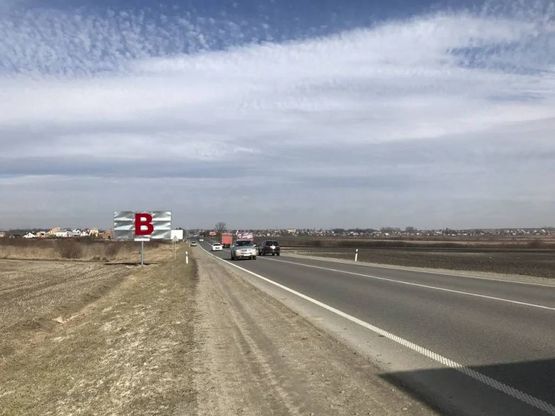 Фото рекламной плоскости по адресу Обїздна М-06, Київ-Чоп, рух в напрямку до с. Кам"янопіль та в сторону Києва 2 Фото рекламной плоскости по адресу Обїздна М-06, Київ-Чоп, рух в напрямку до с. Кам"янопіль та в сторону Києва 2