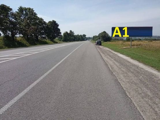 Фото рекламной плоскости по адресу М-06 Київ-Чоп, с.Підбірці в сторону Винник лівий