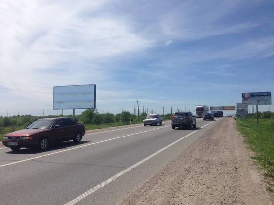Фото рекламной плоскости по адресу Об'їзна М-06, Київ-Чоп, с. Зубра в сторону Панської Гори