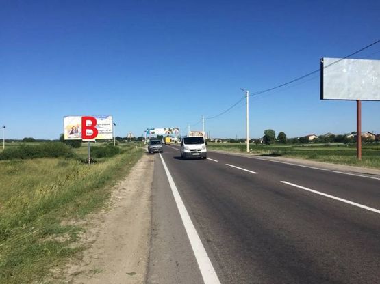 Фото рекламной плоскости по адресу Обїздна М-10, Львів - Краківець, с. Підрясне біля Ресторану Смерековий Двір рух в сторону Львова