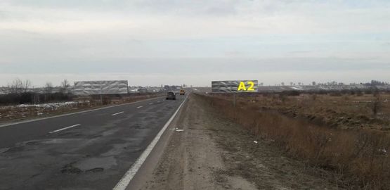 Фото рекламной плоскости по адресу М-09, Тернопіль-Львів-Рава-Руська, за с. Великі Грибовичі у напрямку до с. Куликів та м. Жовква (правий)