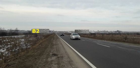 Фото рекламної площини за адресою М-09, Тернопіль-Львів-Рава-Руська, за с. Великі Грибовичі у напрямку до с. Куликів та м. Жовква (лівий)