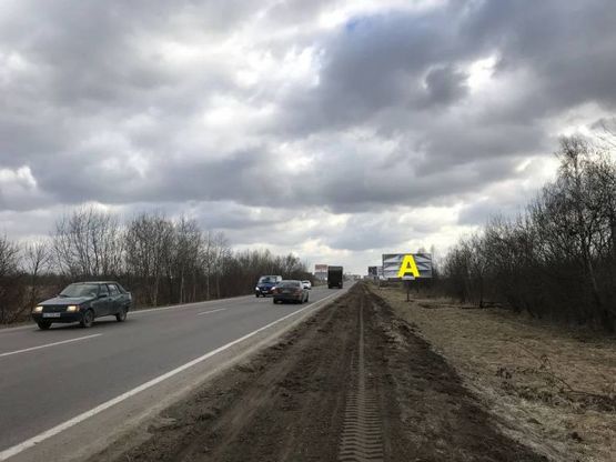 Фото рекламной плоскости по адресу М-10 Західний обхід м. Львова, біля Trans Service-1 в сторону ТРЦ King Cross Leopolis