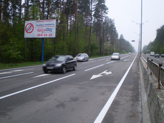 Фото рекламной плоскости по адресу Новая Кольцевая дорога(2600м до КПП Гостомель) на перекрёстке(В) к КПП Гостомель ( загородные рестораны ) к АШАНУ и Эпицентру