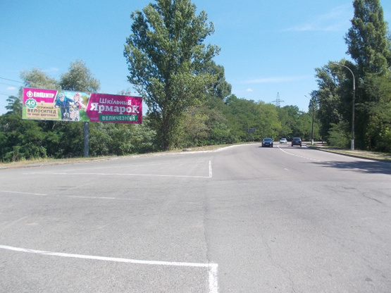 Фото рекламной плоскости по адресу ул.Шолуденко- ул.Ватутина направление в Вышгород (левый)
