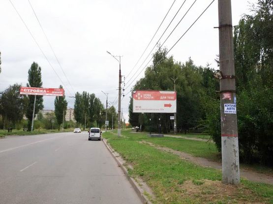 Фото рекламної площини за адресою ул. Электрозаводская, 10а (ТЦ "Атлант", маг "Стройка"), к объездной дороге Фото рекламної площини за адресою ул. Электрозаводская, 10а (ТЦ "Атлант", маг "Стройка"), к объездной дороге