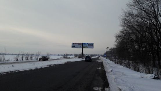 Фото рекламной плоскости по адресу ул. Днепропетровское шоссе, въезд, напротив кафе "CAMEL" Фото рекламной плоскости по адресу ул. Днепропетровское шоссе, въезд, напротив кафе "CAMEL"