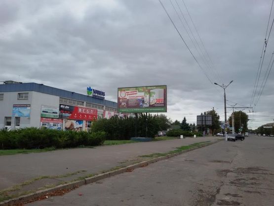 Фото рекламной плоскости по адресу ул. С. Колачевского (23-го Лютого), 16 - ул. Конституционная (ТЦ "Reinford"), к ст. Роковатая Фото рекламной плоскости по адресу ул. С. Колачевского (23-го Лютого), 16 - ул. Конституционная (ТЦ "Reinford"), к ст. Роковатая