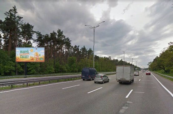 Фото рекламної площини за адресою Бориспольское шоссе, 500 м до ресторана "Козацький стан" (черта города, стелла Киева, с/м Новая Линия). 1,5 км до Харьковской площади. Электроопора № 35-34 (в районе 19 км 200 м), в сторону Борисполя