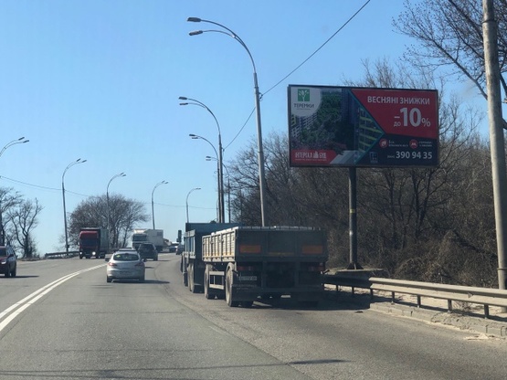 Фото рекламної площини за адресою ул. Заболотного, 1330 м от заправки ANP, в сторону ул. Ак. Глушкова. ТЦ АРТМОЛ, Гипермаркеты ДОМОСФЕРА и АТМОСФЕРА
