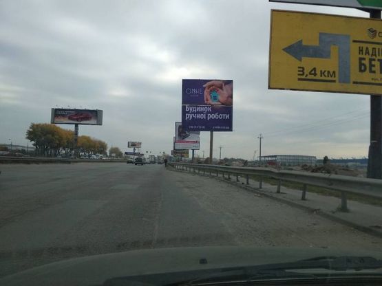 Фото рекламної площини за адресою Окружная дорога ( напротив Арма Моторс ) 2
